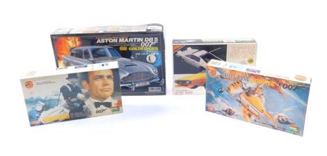 Two Airfix James Bond model kits, comprising James Bond Auto Gyro, and James Bond and Oddjob, scale 1:12, Doyusha Aston Martin DB5 007 from Goldfinger model kit, scale 1:24, and an Nichimo Lotus Esprit, all boxed. (4)