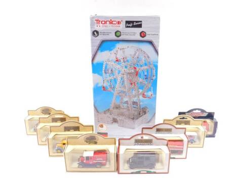 A Tronic Solar Power Ferris Wheel DIY Metal Kit, boxed, together with Days Gone and other boxed die cast trucks. (9)