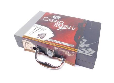 A Corgi 007 Casino Royale die cast set, limited edition, cased, comprising Aston Martin DB5 and DBS, silver embossed playing cards and poker chips, CC99194.