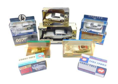 A Corgi die cast James Bond Aston Martin DB5, 50th Goldfinger Anniversary Model 04203, further Corgi die cast models of The Aston Martin DB5, and sundries, all boxed. (10)