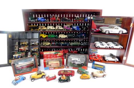 Lledo Corgi and other die cast vintage trucks, cars and sundry vehicles, together with three display cases. (qty)