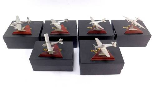 Royal Hampshire Art Foundry metal models of fighter and bomber planes, comprising Mosquito, Lancaster, Hurricane, Gypsy Moth, Spitfire, and Dakota, boxed. (6)