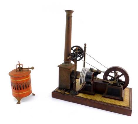 A Bing tin plate Stirling engine, 30.5cm H, 28cm L, and a further small cylinder engine, 14cm H. (2)