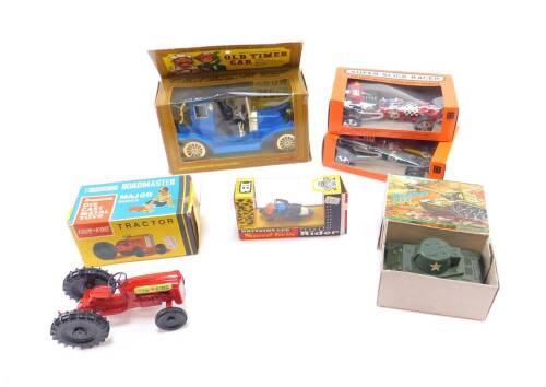 A Lonestar die cast model of a Farm King Tractor, Woolbro fiction Sherman tank, Britains Speed Twin Rider, Play Art battery operated Old Timer Car, and two Universal Products, Superslick Racers, all boxed. (6)