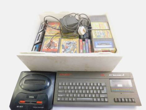 A Sinclair ZX Spectrum Plus 2 computer, 128K, Sega Megadrive II, 16 bit, together with assorted game cassettes, for both units. (qty)