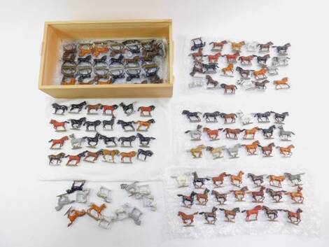 Various 20thC lead cavalry horses, varying colours, to include black, 4cm H, brown, etc. (qty)