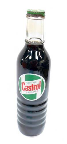 A Castrol XXL oil bottle.