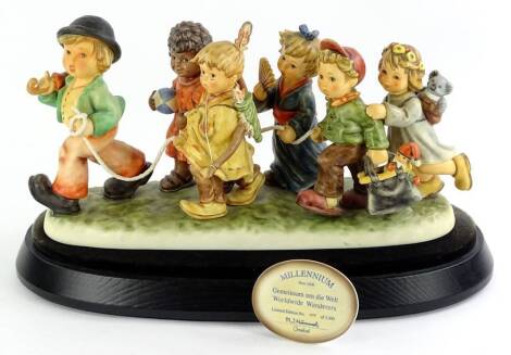 A Hummel figure group made for the Millennium, titled Worldwide Wonder, limited edition number 0279 of 2000, sold with original plinth, presentation plaque and box etc.