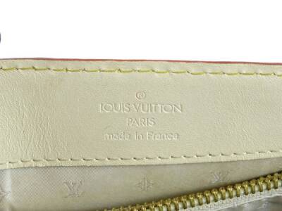 A Louis Vuitton Le Fabuleux leather handbag, in white, with leather handles and brass hardwear, stamped Louis Vuitton made in France to interior, with two keys and dustbag, 36cm W, 22cm H, 12cm D. - 3