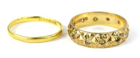 Two rings, to include a 22ct gold wedding band, 1.8g, and a 9ct gold dress ring, set with white stones, 3.1g all in.