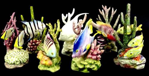 A collection of seven Royal Worcester porcelain models of exotic fish, each modelled by Ronald Van Ruyckevelt to include a spadefish, a red hind, yellow grunt, four eyed fish, blue angel, sergeant major and blue angel. (undecorated)