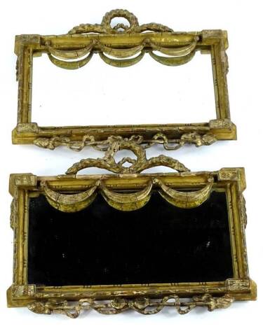 A pair of late 19thC gilt gesso wall mirrors, each with a laurel crest, the rectangular plate decorated with swags, patera, ribbons etc., 27cm H, 34cm W. Provenance: The property of Joan Stephenson, Kirkwood, North Church Walk, Newark, Nottinghamshire.