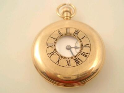 A 9ct gold half hunter pocket watch by J.W. Benson