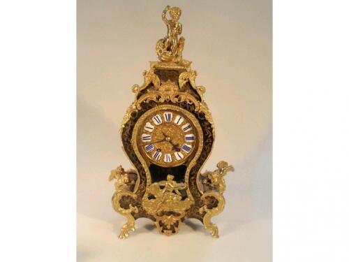 A 19thC French 'boule' bracket clock in the Louis XV style