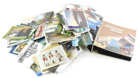 A large quantity of 20thC postcards etc.