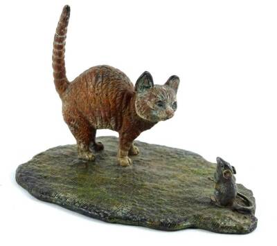 An Austrian style cold painted bronze figure of a ginger cat with a mouse, on a shaped base, impressed marks to underside, 7cm W.