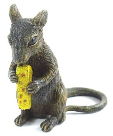 A cold painted bronze model of a mouse with a wedge of cheese, impressed marks to underside, 7cm H.