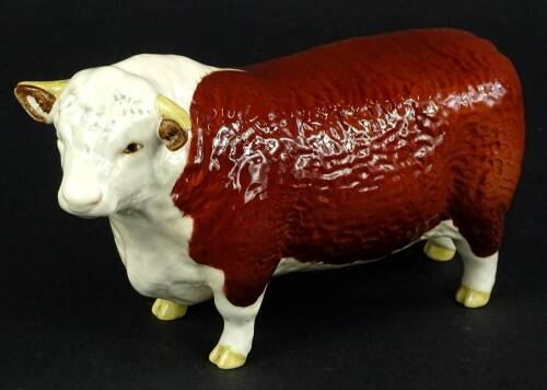 A Beswick model of a Hereford Bull, in original green box with label.