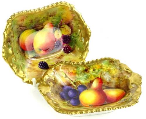 A pair of Royal Worcester porcelain rectangular dishes, each decorated with fruit within gilt borders, signed N Ayrton to one, the other indistinct, printed marks to underside in puce, 11cm W.