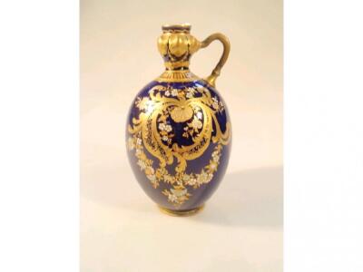 A Royal Crown Derby ovoid flask