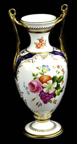 A Spode porcelain two handled vase, decorated with flower made to commemorate the 200th Anniversary of the Creation of bone china by Spode, produced in limited edition of 200, numbered 28 etc., in presentation case.