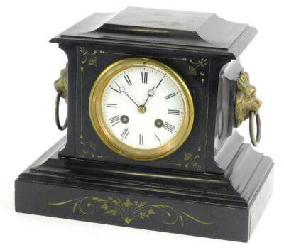 A late 19thC French black slate and parcelled gilt mantel clock, the enamel dial with Roman numerals, the case with gilt metal lion mask handles, 36cm W.