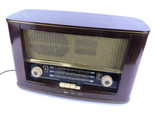 A vintage Bush radio, in a walnut case, type VHF.72, 48cm W.