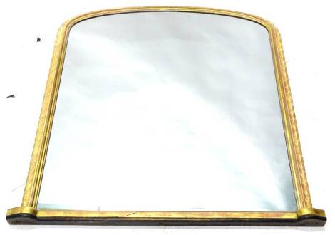 A Victorian gilt over mantel mirror, with arched plate, the frame with a gadrooned border, 132cm H, 121cm W.