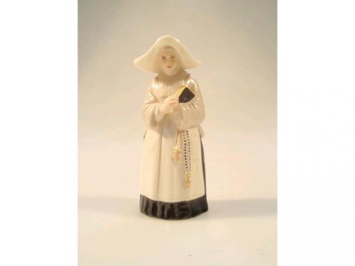 A Royal Worcester porcelain candle snuffer