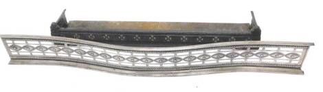 A 19thC pierced steel serpentine fender, decorated with ovals, beads, etc., 135cm W, and a Victorian case iron fire curb. Provenance: The property of Joan Stephenson, Kirkwood, North Church Walk, Newark, Nottinghamshire.