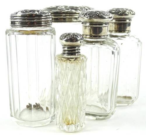 Edwardian silver and glass jars, to include needle jar with cover, London 1902, 9 1/2cm H, various other jars, etc., (5).