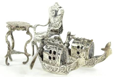 Various Continental white metal ornaments, miniature chair, 6cm H, table and two boats, various marks etc. (4) Provenance: The property of Joan Stephenson, Kirkwood, North Church Walk, Newark, Nottinghamshire.