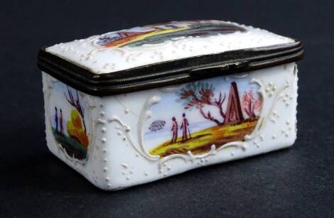 An 18thC enamel style pill box, of rectangular form with rounded ended, decorated with panels of figures in a naturalistic setting, with metal mounts, 6cm (AF).