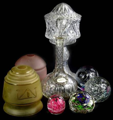 A collection of glass, to include a cut glass table lamp and shade, various paperweights, to include a faceted example bearing monogram and two opaque lamp shades.