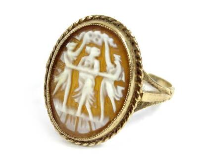 A 9ct gold cameo ring, with oval cut cameo of female and two males, with rope twist design border, 2cm x 1.4cm, with V design shoulders, ring size L, 2.6g all in.