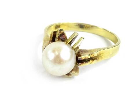 A culture pearl dress ring, with sunburst type design, forming four points and two extra points as shoulders, on yellow metal band, marked 585, ring size P, 4.6g all in.