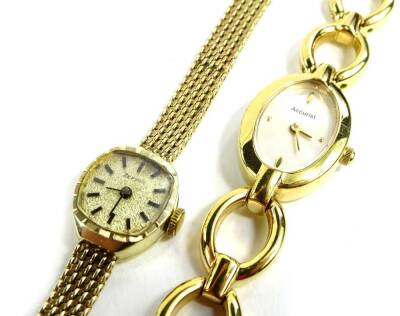 Two ladies wristwatches, to include a Zephir ladies wristwatch, with articulated bracelet, yellow metal, marked 585, 13.8g all in, and an Accurist gold plated ladies wristwatch.