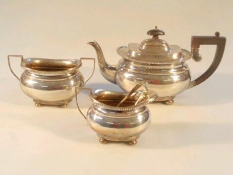 A George V silver tea set of three pieces