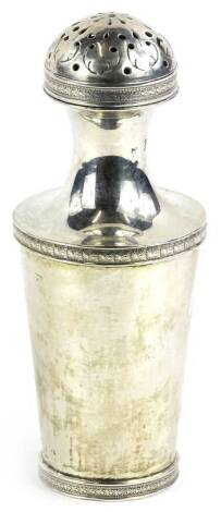 A Continental silver coloured metal sugar castor, with waisted neck, bands of flowerheads, indistinct marks to neck, 14cm H.