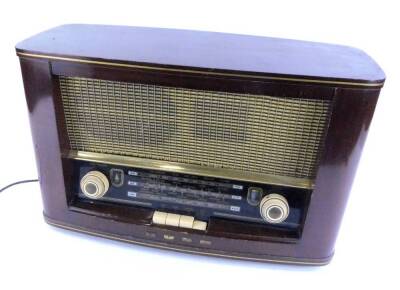 A vintage Bush radio, in a walnut case, type VHF.72, 48cm W. - 2