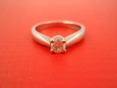 An 18ct white gold diamond solitaire ring