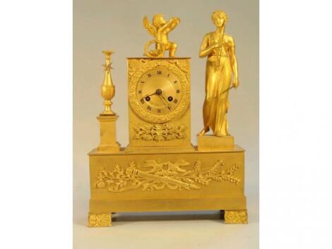 A 19thC French gilt metal mantel clock by Le Ory