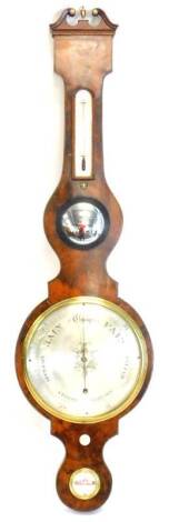 J. Smith. A mid 19thC mahogany cased aneroid barometer, with brass dry damp gauge thermometer and engraved dial, stamped J Smith Warranted, 103cm L.