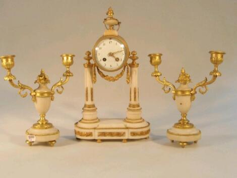 A late 19thC French gilt metal and alabaster clock garniture of three pieces