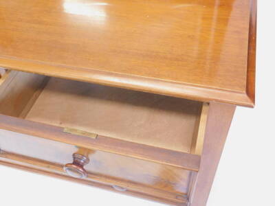 A late 19th/early 20thC mahogany dressing table, the rectangular bevelled mirror plate on turned supports, the base with two short two long drawers, with turned wood handles on turned tapering legs, 105cm W. - 2