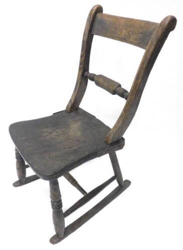 A Victorian country made rocking chair, with Oxford bar back solid seat, on runners, (AF).