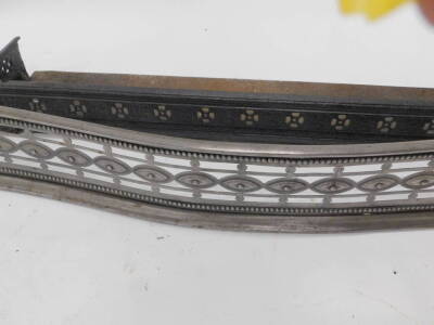 A 19thC pierced steel serpentine fender, decorated with ovals, beads, etc., 135cm W, and a Victorian case iron fire curb. Provenance: The property of Joan Stephenson, Kirkwood, North Church Walk, Newark, Nottinghamshire. - 2