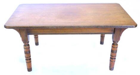 A mahogany coffee table, the rectangular top with canted corners on turned legs, 109cm W. Provenance: The property of Joan Stephenson, Kirkwood, North Church Walk, Newark, Nottinghamshire.