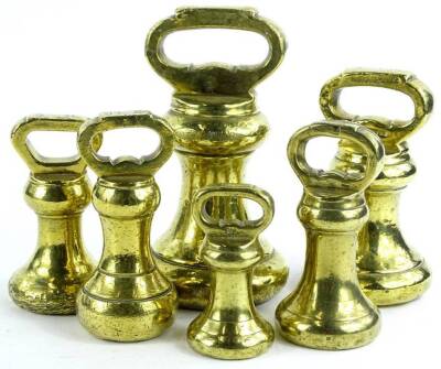 A graduated set of brass bell shaped weights, 17cm H etc. (a quantity) - 2