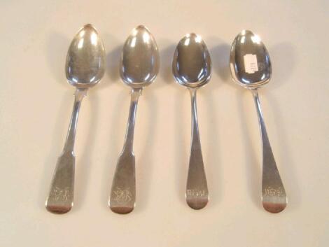 Two silver Georgian Old English pattern serving spoons and a pair of Georgian